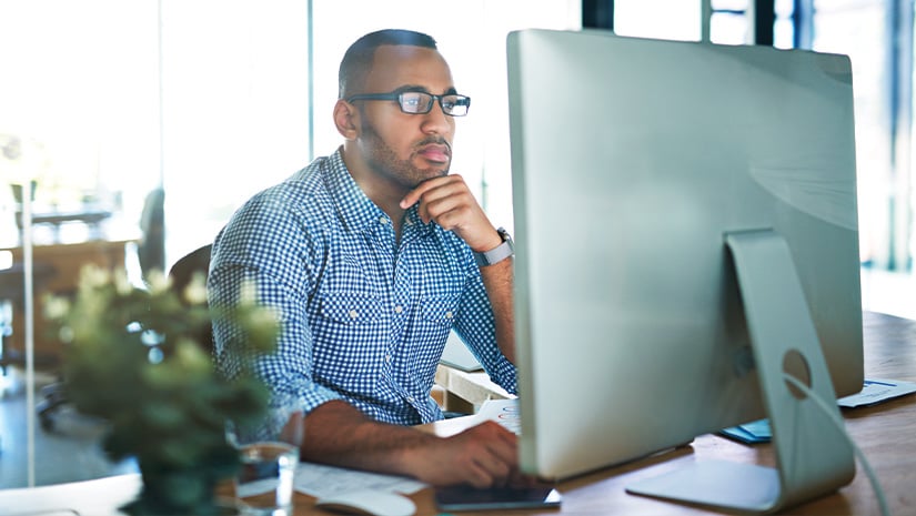 Young businessman working in his office