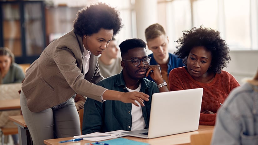 African_Americans_college_students_eleaning_with_their_teacher