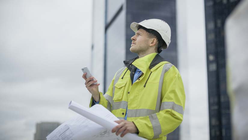 Architect working at construction site