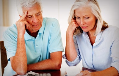 Senior Couple reviewing Document N