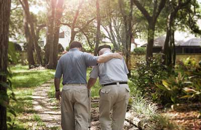 Son Walking with Father Down Path